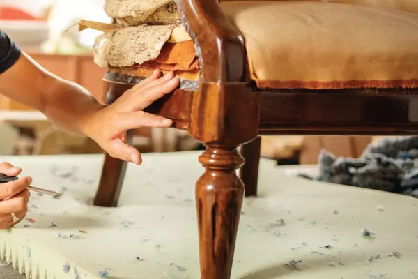 Craftsman Performing In Home Wood Furniture Touch Up in Edmonton